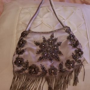 Silver satin evening bag